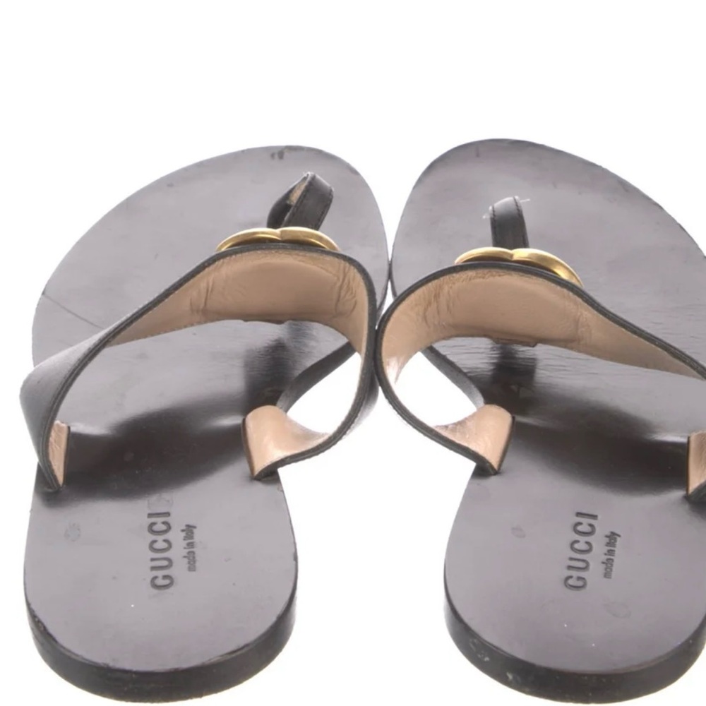 Gucci Black and Gold Sandals with Elegant Design